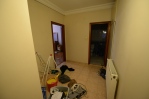Looking the other way, towards the bathroom and the big bedroom. (All areas have since been cleaned. :))
